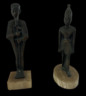 Lot 634 - Two 20th century Ancient Egyptian style bronze...