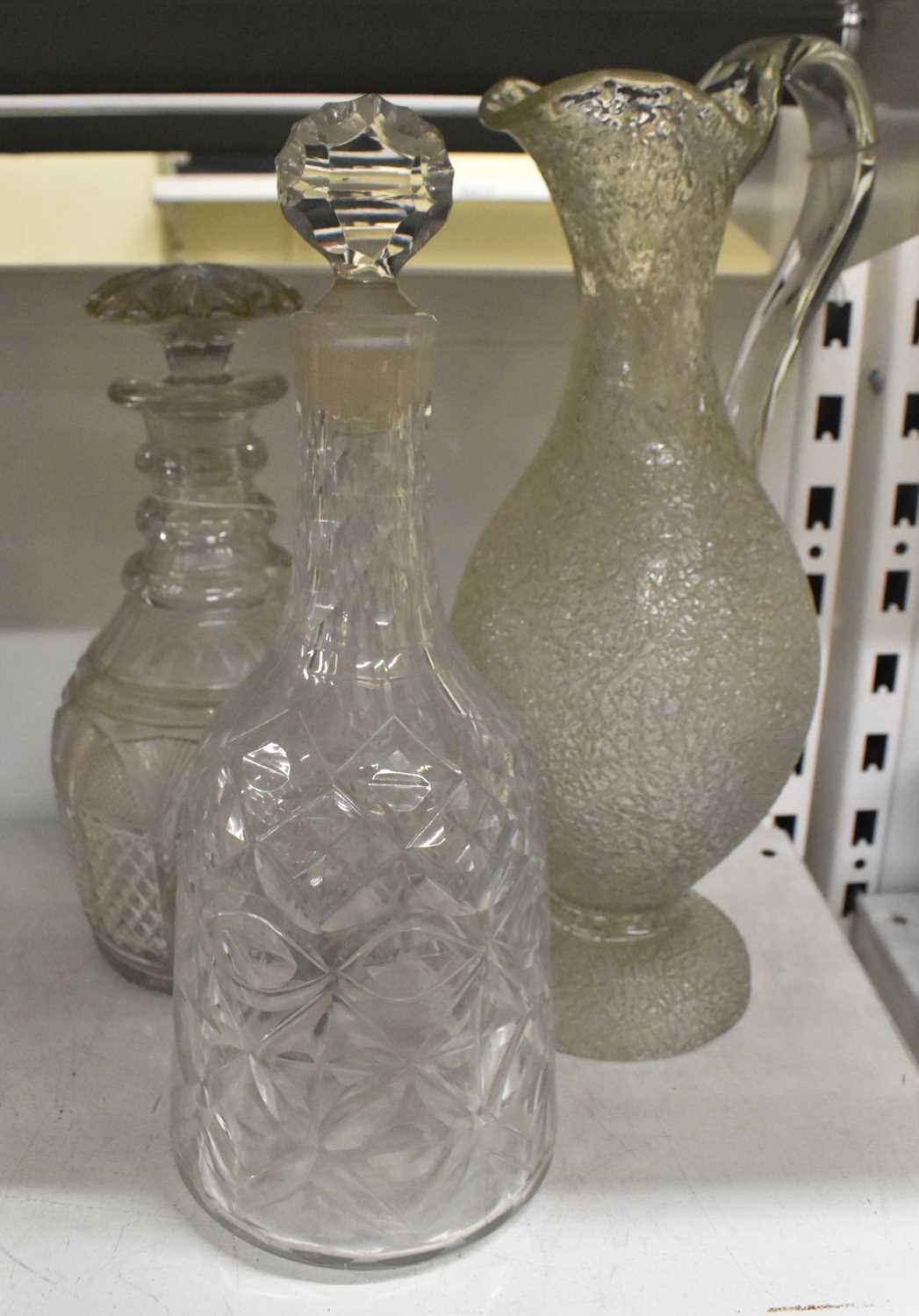 Lot 538 - A late 19th century crackle glass claret jug...