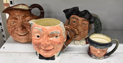 Lot 528 - ROYAL DOULTON; a group of three character jugs,...