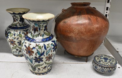 Lot 502 - A pair of ancient Islamic style earthenware...