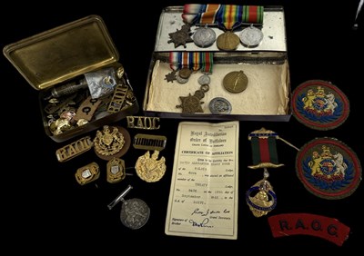 Lot 392 - A group of WWI and WWII medals, with matching...