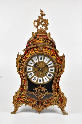 Lot 364 - A reproduction Boulle work effect mantel clock...