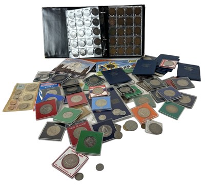 Lot 831 - An album of assorted coinage including pennies,...