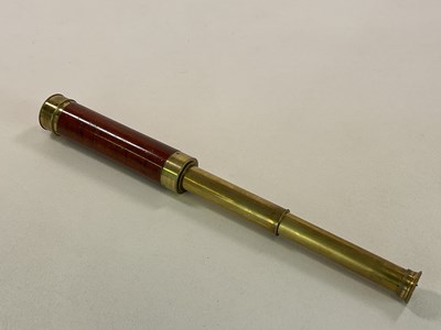 Lot 49 - H HUGHES; a brass three drawer telescope with...