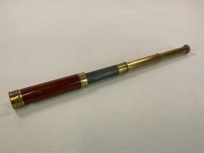 Lot 49 - H HUGHES; a brass three drawer telescope with...