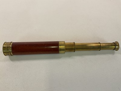 Lot 49 - H HUGHES; a brass three drawer telescope with...