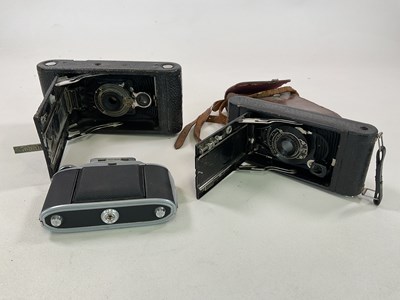 Lot 50 - Two vintage Kodak bellows cameras, and another...