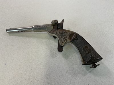 Lot 22 - A late 19th/early 20th century pocket pistol...