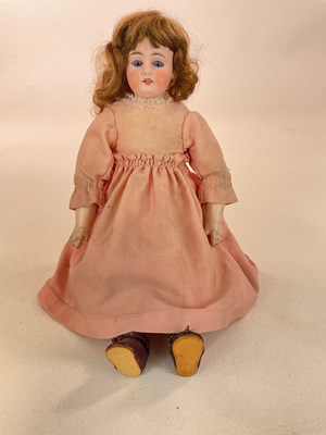 Lot 259 - A Rohmer style doll with china head and arms...