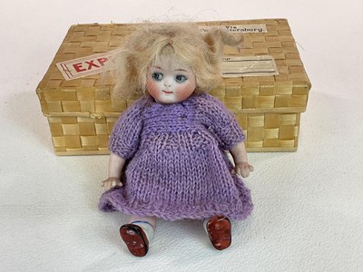 Lot 260 - A German bisque Googly doll with Googly eyes,...