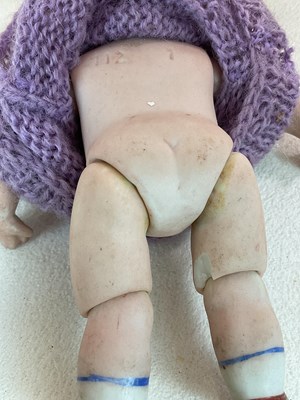 Lot 260 - A German bisque Googly doll with Googly eyes,...
