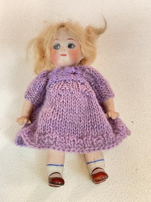 Lot 260 - A German bisque Googly doll with Googly eyes,...