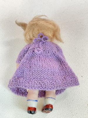 Lot 260 - A German bisque Googly doll with Googly eyes,...