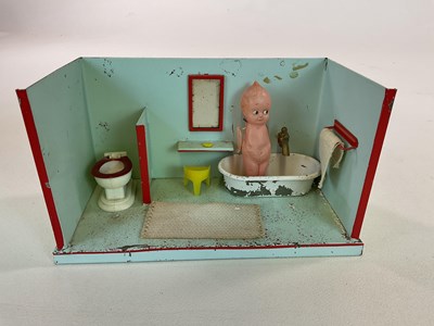 Lot 268 - A model tin bathroom with water tanks and a...