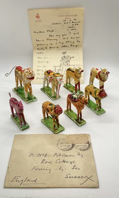 Lot 270 - A set of eight Indian painted wooden animals...