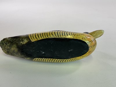 Lot 88 - A wooden decoy type duck.