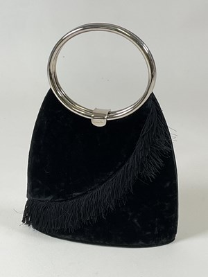 Lot 218 - CHRISTIAN DIOR; a black velvet evening bag...