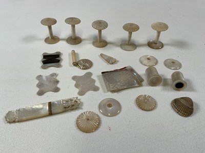 Lot 163 - A collection of mother of pearl sewing...