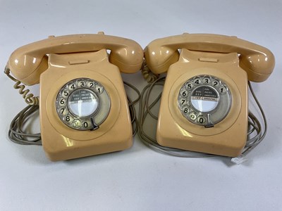 Lot 165 - Two vintage cream coloured telephones, with...