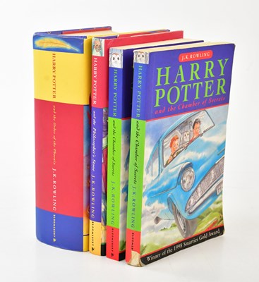 Lot 2663 - J K ROWLING; a group of four Harry Potter...