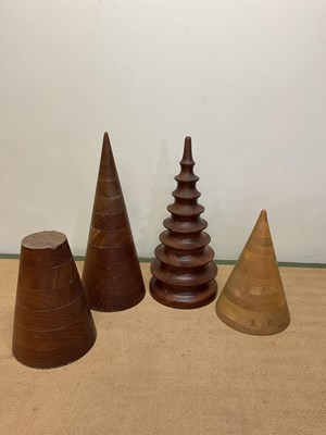 Lot 85 - A small collection of wood turned sculptures,...
