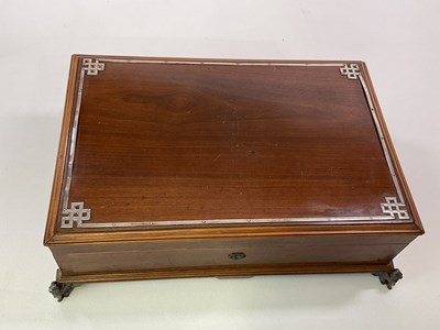 Lot 86 - A walnut white metal mounted Arts and Crafts...