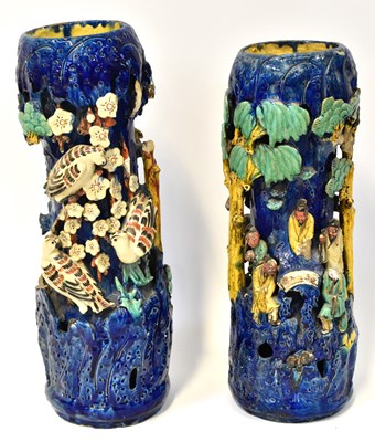 Lot 416 - A pair of Chinese-style Shiwan pottery vases...