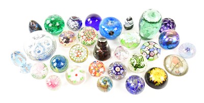 Lot 1564 - A collection of various glass paperweights...