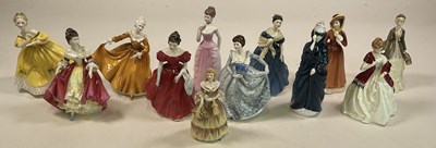 Lot 267 - ROYAL DOULTON; seven figures comprising...