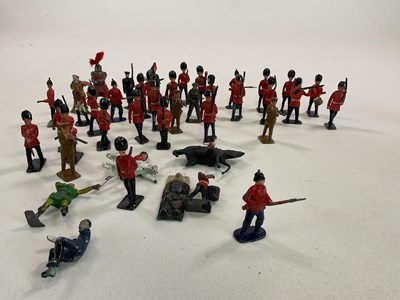 Lot 275 - A group of painted vintage lead soldiers, also...