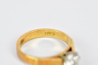 Lot 65 - An 18ct yellow gold diamond solitaire ring,...