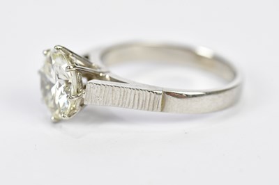 Lot 28 - A platinum diamond solitaire ring, the eight...