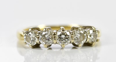 Lot 88 - An 18ct yellow gold five stone diamond ring,...