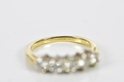 Lot 88 - An 18ct yellow gold five stone diamond ring,...