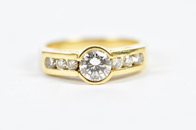 Lot 51 - A yellow metal diamond set ring, the principal...