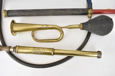 Lot 239 - A vintage brass car horn with rubber bulb, a...