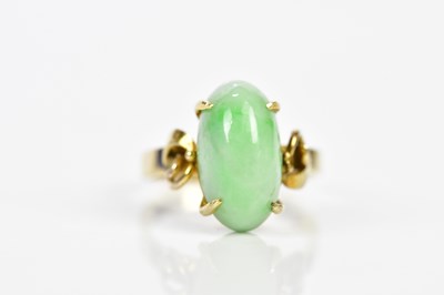 Lot 118 - An 18ct yellow gold and cabochon jade dress...