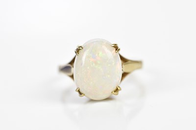 Lot 130 - A 9ct yellow gold opal ring, size M 1/2,...