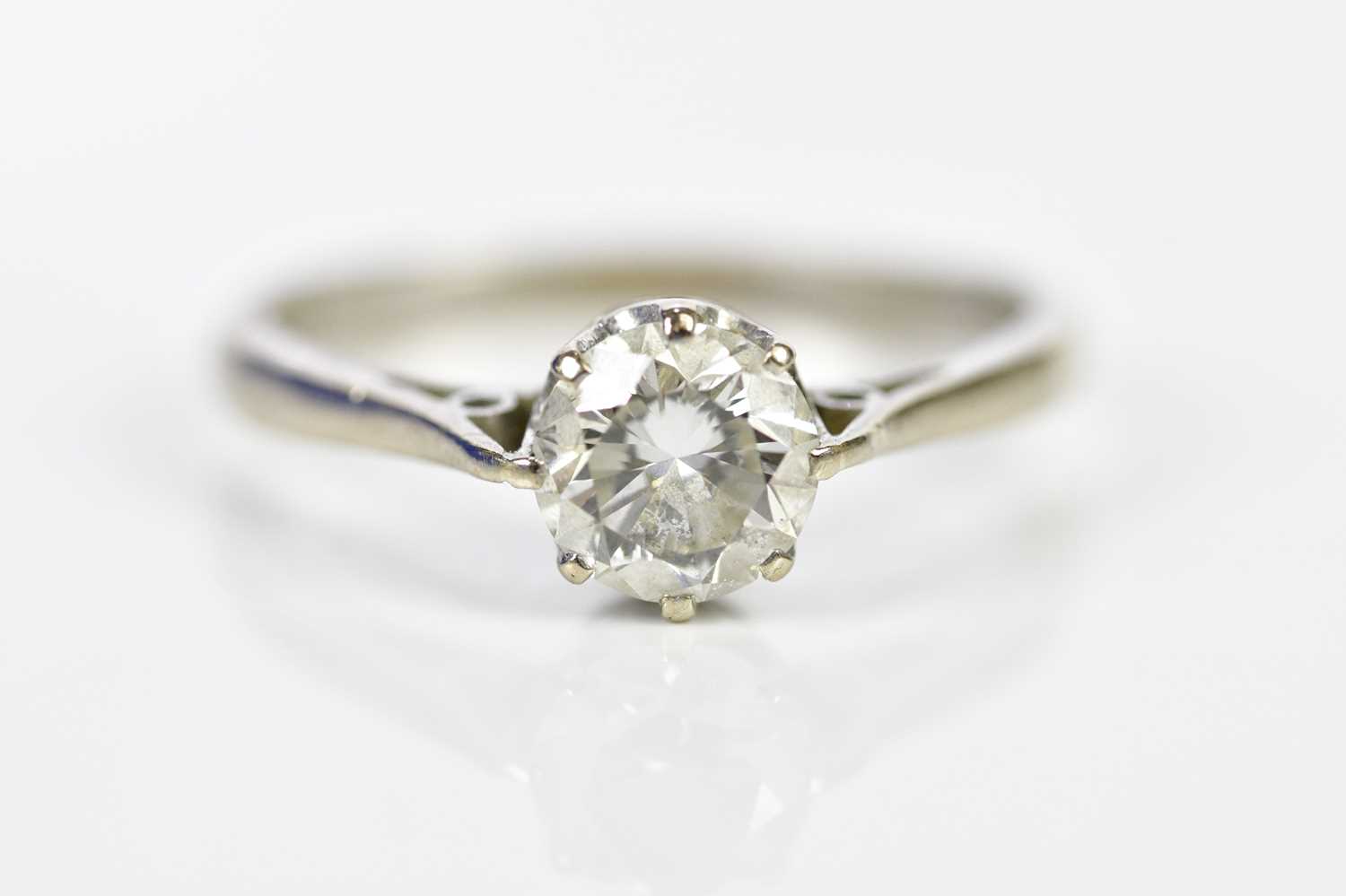 Lot 59 - An 18ct white gold and diamond solitaire ring,...