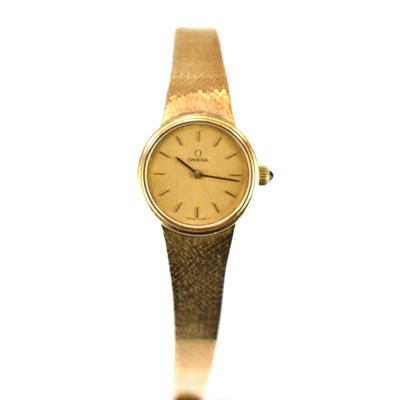 Lot 878 - OMEGA; a ladies' 9ct gold wristwatch, the gold...