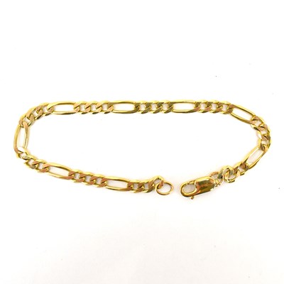 Lot 749 - A 9ct gold figaro link bracelet with lobster...