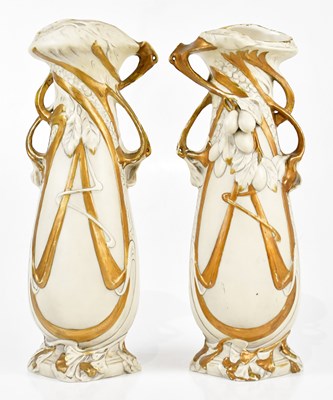 Lot 1442 - ROYAL DUX; a pair of Art Nouveau twin handled...