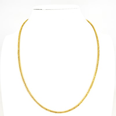 Lot 771 - A 9ct gold beaded necklace united with a...