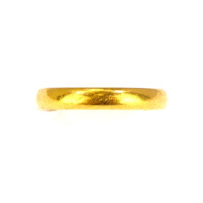 Lot 683 - A 22ct gold thin wedding band, size L, approx....