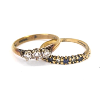 Lot 732 - A 9ct gold ring with three small claw set...