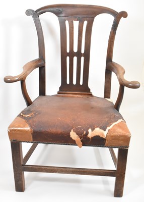 Lot 77 - A George III oak armchair with yoke-shaped top...