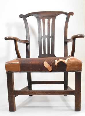 Lot 77 - A George III oak armchair with yoke-shaped top...