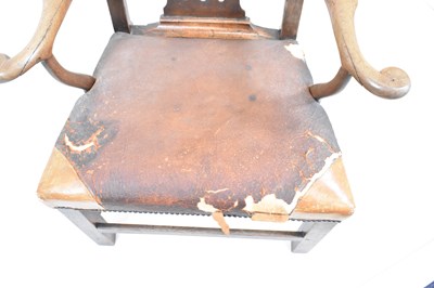 Lot 27 - A George III oak armchair with yoke-shaped top...