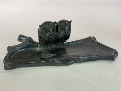 Lot 127 - A German pewter ink well, styled as owls...