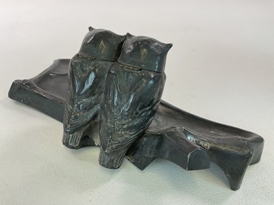 Lot 127 - A German pewter ink well, styled as owls...